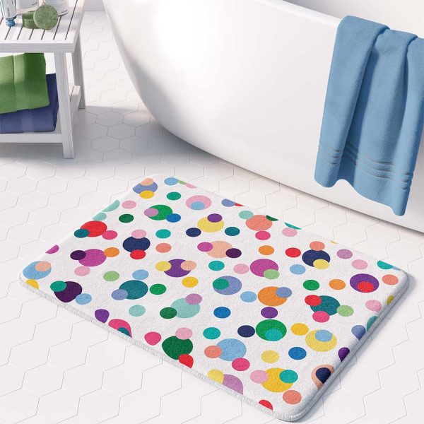 A vibrant and playful microfiber bath mat for kids, adorned with colorful polka dots in various sizes. Non-slip, quick-drying, and mold-resistant.