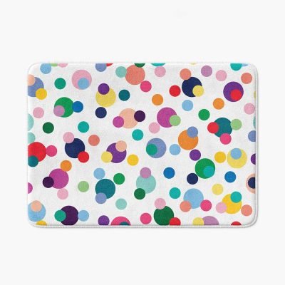 A vibrant and playful microfiber bath mat for kids, adorned with colorful polka dots in various sizes. Non-slip, quick-drying, and mold-resistant.