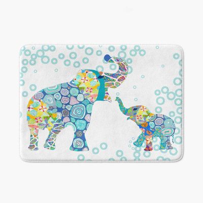 A white microfiber non slip bath mat for toddler boys featuring a charming blue elephant print. Mold and mildew resistant, plush, soft, non-slip, machine washable, and quick drying.