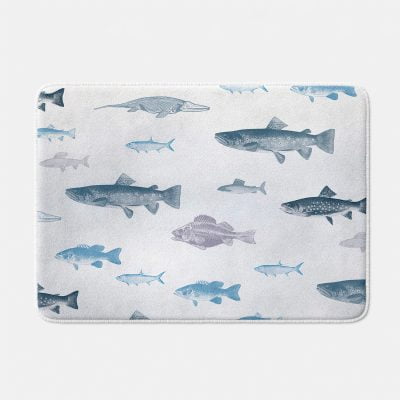 Blue fish bath mat made of microfiber with non-slip features.