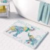 A white microfiber non slip bath mat for toddler boys featuring a charming blue elephant print. Mold and mildew resistant, plush, soft, non-slip, machine washable, and quick drying.