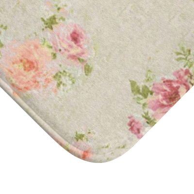 Close-up of subtle apricot & pink roses on bath mat