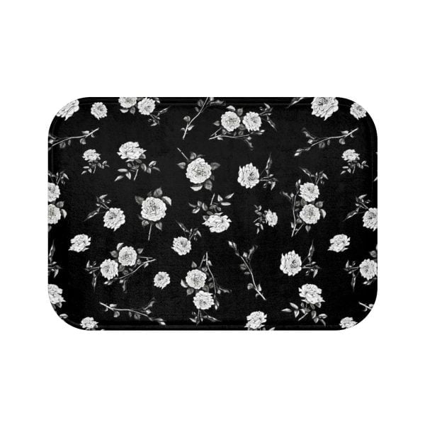 Make a statement with this stylish black & white rose bath mat