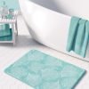 Ozscape designs bathroom decor - Blue turquoise non slip bath mat made of microfiber with coastal coral pattern.