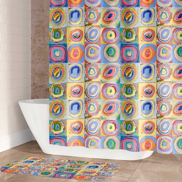 Designer fabric shower curtain with colorful abstract circles.