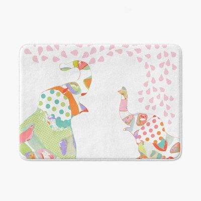 A white microfiber non slip bath mat for kids featuring a playful pink and green elephant print. Mold and mildew resistant, plush, soft, machine washable, and quick drying.