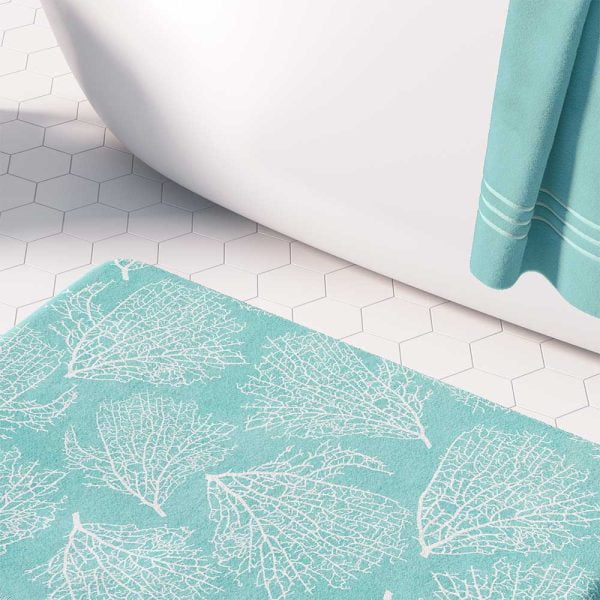 Blue turquoise non slip bath mat made of microfiber with coastal coral pattern.