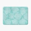 Blue turquoise non slip bath mat made of microfiber with coastal coral pattern.
