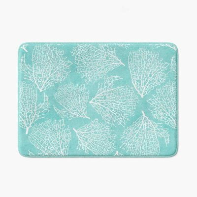 Blue turquoise non slip bath mat made of microfiber with coastal coral pattern.