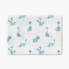 Blue dinosaur patterned bath mat for a baby boy's bathroom