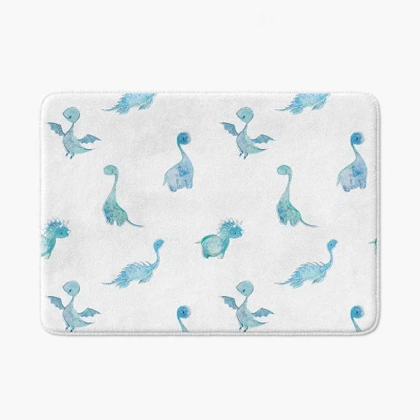 Blue dinosaur patterned bath mat for a baby boy's bathroom