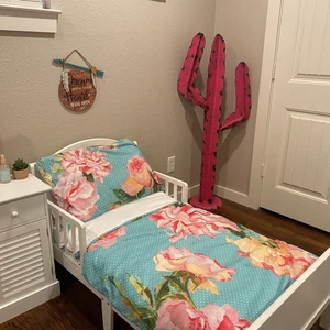 A purchase for our youngest granddaughter. She is soooo proud of her new toddler bed and "cooo" blanket.