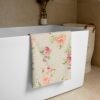 Beige, apricot and pink floral patterned bath towel