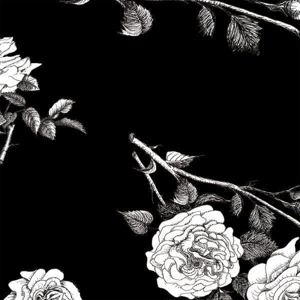close up black rose floral print on blacka nd white bath towels