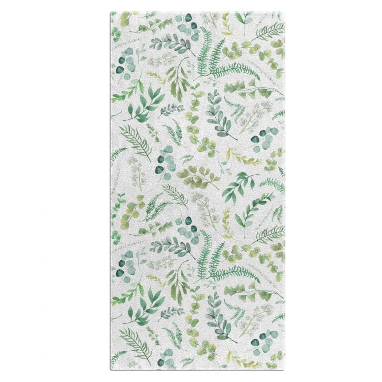 White BAth towel with leafy green decorative floral print and cotton terry back