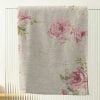 beige and pink floral velour bath towels with white cotton terry loop back