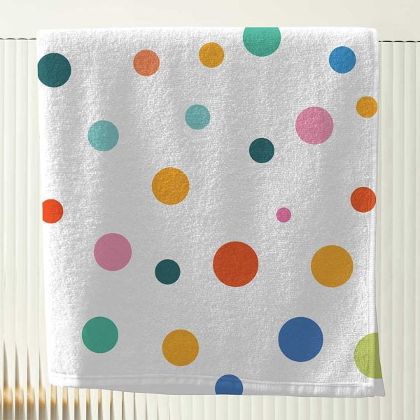 Orange, yellow, green and blue polka dot bath towels for kids