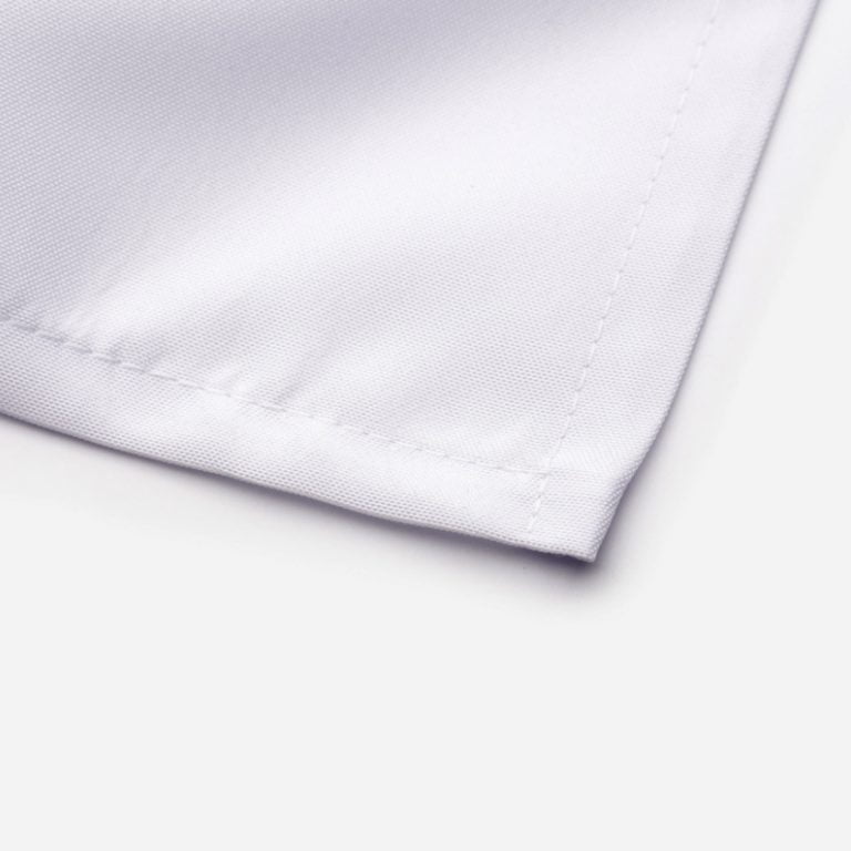 Hemmed bottom edge of shower curtain