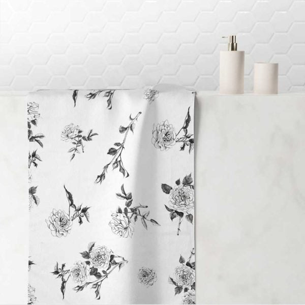 white hand towel with black floral rose pattern