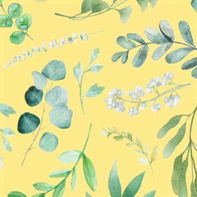 close up of cotton velour yellow floral print on patterned bath towel