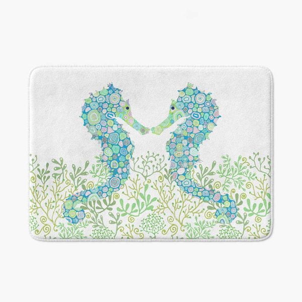 Non-slip microfiber bath mat for kids' bathroom with blue and green seahorse pattern.
