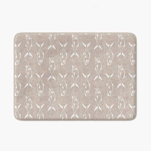 Beige non-slip bath mat featuring white trevally fish design.