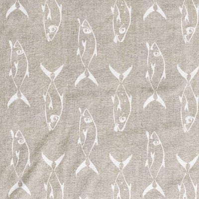 beige and white fish patterned bath towels
