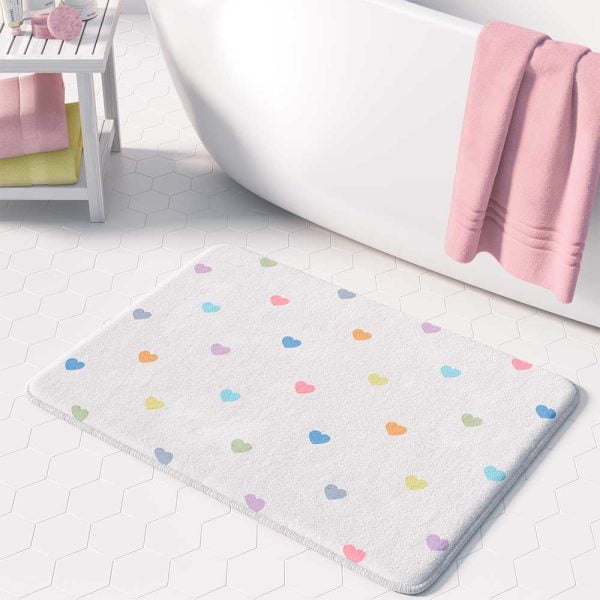 Non slip microfiber bath mat with pastel love hearts pattern.