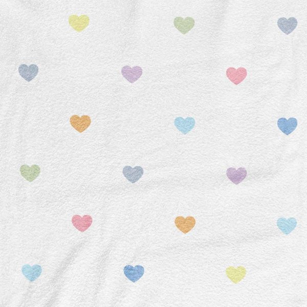 detailed view of love heart print on kids bath towel