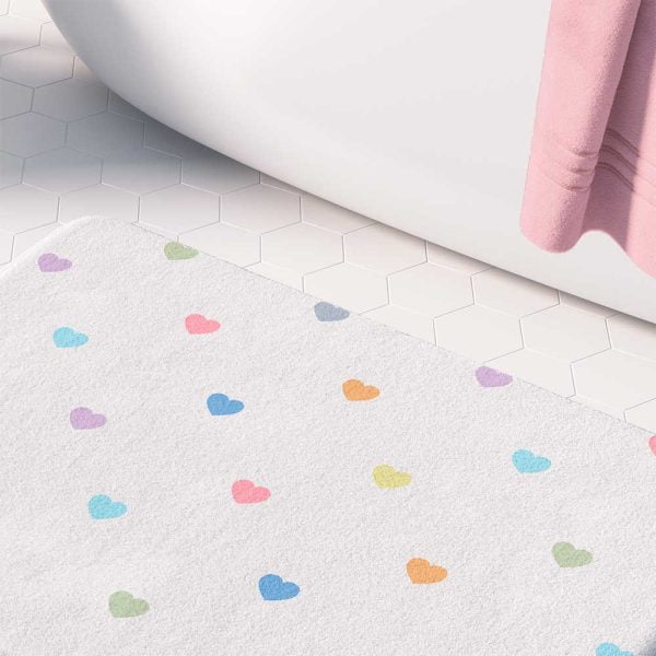 Non slip microfiber bath mat with pastel love hearts pattern.