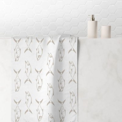 Coastal Fish Patterned Hand Towel in Beige and White.