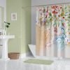 Bathroom setting with watercolor wildflower fabric shower curtain.