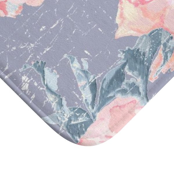 A vintage pink rose watercolor floral bath mat in lavender purple, perfect for adding elegance to any bathroom. Mold and mildew resistant, quick-drying, non-slip plush microfiber, washable.