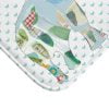 A white microfiber non slip bath mat for kids featuring a playful blue and green elephant print. Mold and mildew resistant, plush, soft, non-slip, machine washable, and quick drying.