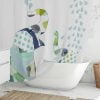 fabric shower curtain for kids bathroom with blue and green elephants.