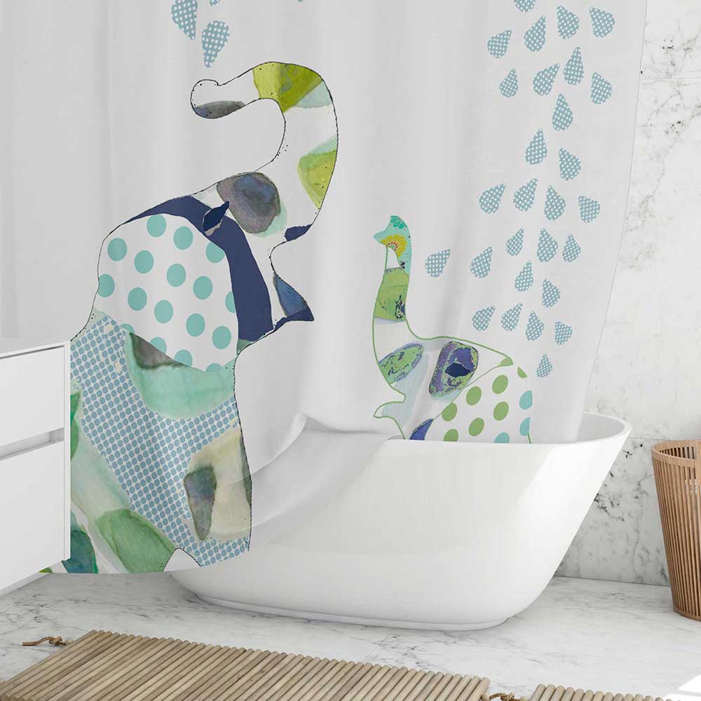 fabric shower curtain for kids bathroom with blue and green elephants.