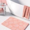 Pink coral patterned microfiber bath mat for coastal bathroom vibe.