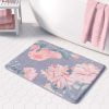 A vintage pink rose watercolor floral bath mat in lavender purple, perfect for adding elegance to any bathroom. Mold and mildew resistant, quick-drying, non-slip plush microfiber, washable.