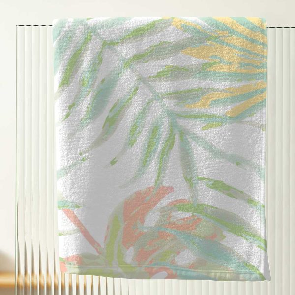 Close-up of abstract tropical apricot palm leaves pattern on artwork.