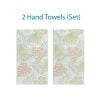 Two hand towels set with abstract tropical apricot palm leaves pattern.