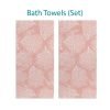 Bath towel set with elegant tropical coral pink pattern.