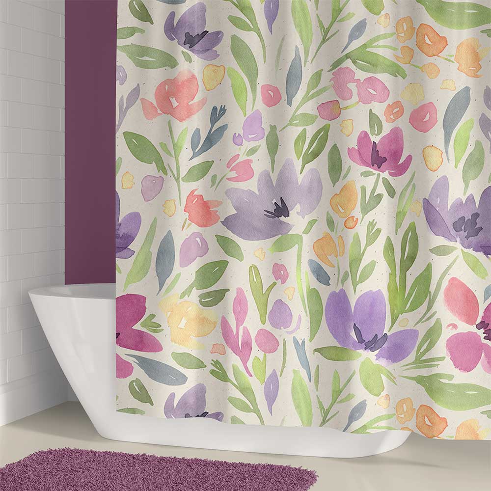 Detailed shot of grommets and hooks included with the floral shower curtain.