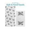 Bath and hand towel set with black and white abstract butterfly prints, perfect for a modern girls' bathroom.