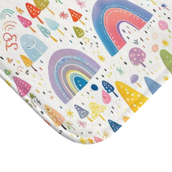 Detailed view of soft microfiber rainbow bath mat for kids' bathroom decor.