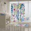 Bright floral fabric shower curtain with lilac, purple, pink, and yellow flowers and strong metal grommets