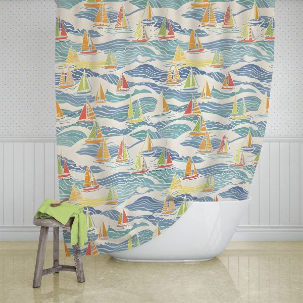 view of beach theme shower curtain with blue yellow green and orange sailboats by Ozscape Designs hanging in bathroom