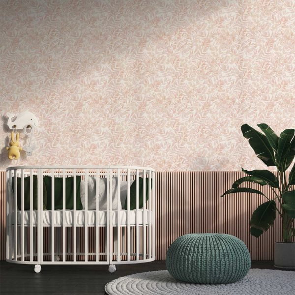 Peachy pink watercolor leaf neutral wallpaper in a baby nursery