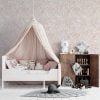 Peachy pink watercolor leaf neutral wallpaper in a baby nursery