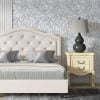 Gray watercolor leaf neutral wallpaper in an elegant bedroom