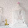 Peachy pink watercolor leaf neutral wallpaper in a baby nursery